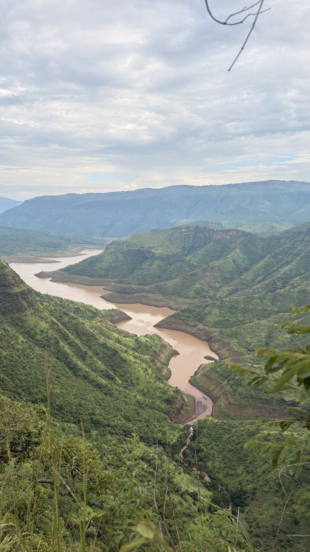 Green Kembata highlands and winding water below